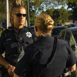 Two PD Officers talking