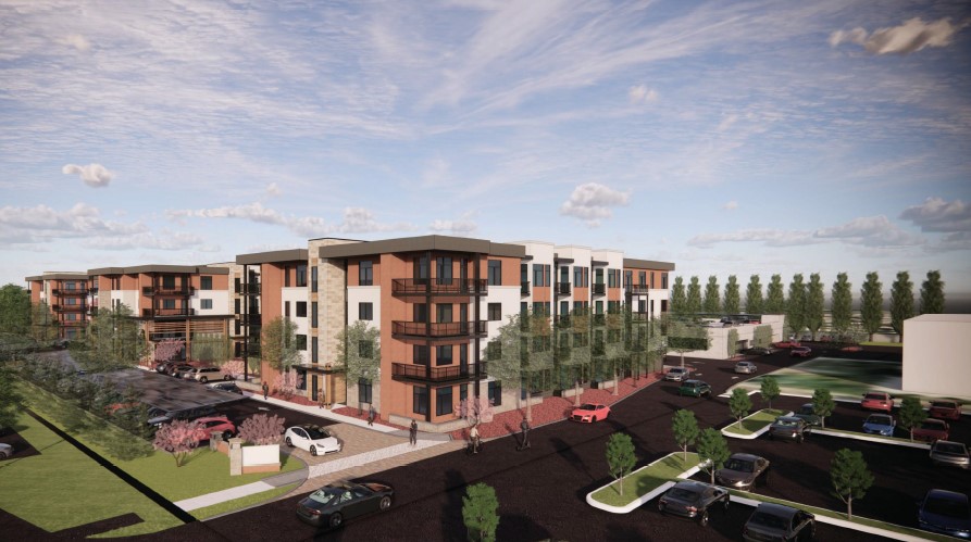 Digital rendering showing the proposed 4-story green valley 3 apartment project surrounded by parking and landscaping