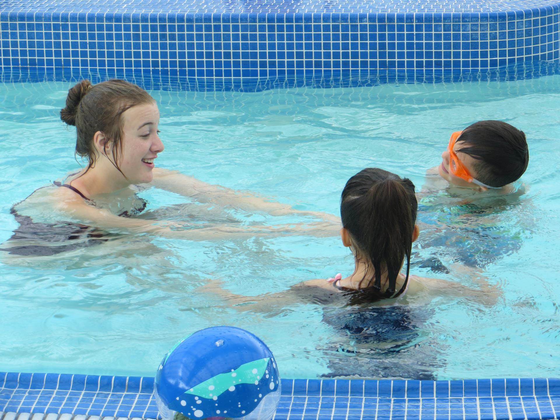 Swim instructor teaching participants