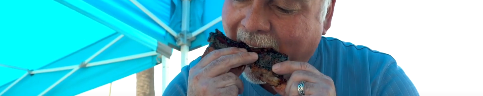 BANNER KCBS Judge tasting ribs